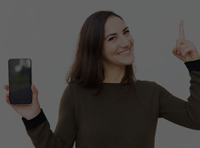 girl smiling and have a phone in hand